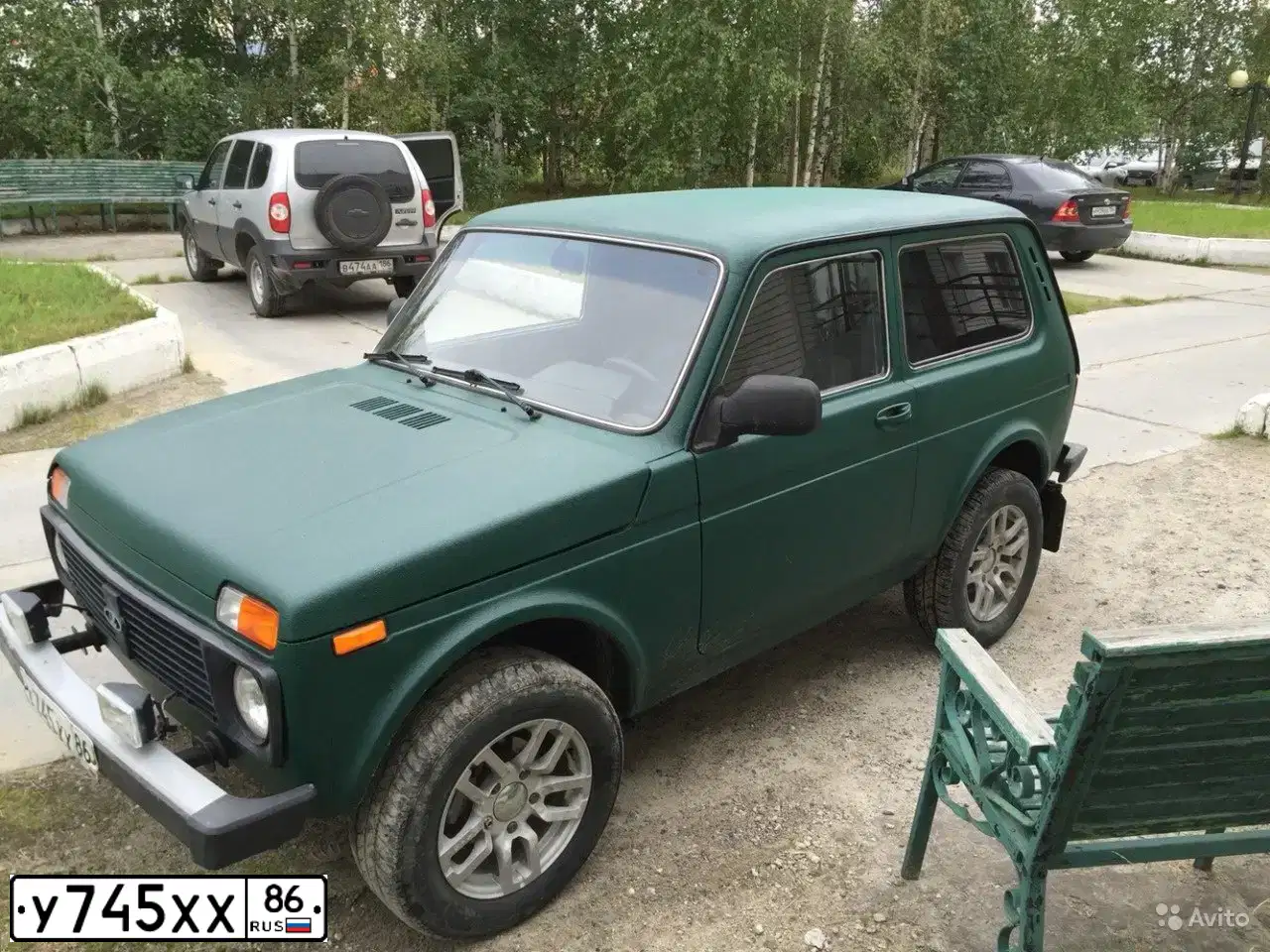 Фото автомобиля LADA 2121 NIVA, 2012 — госномер К273МХ70. Цвет: ТЕМНО - ЗЕЛЕНЫЙ