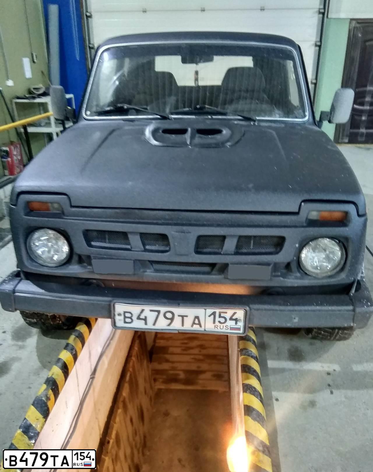 Фото автомобиля LADA 2121, 1996 — госномер М050РУ124
