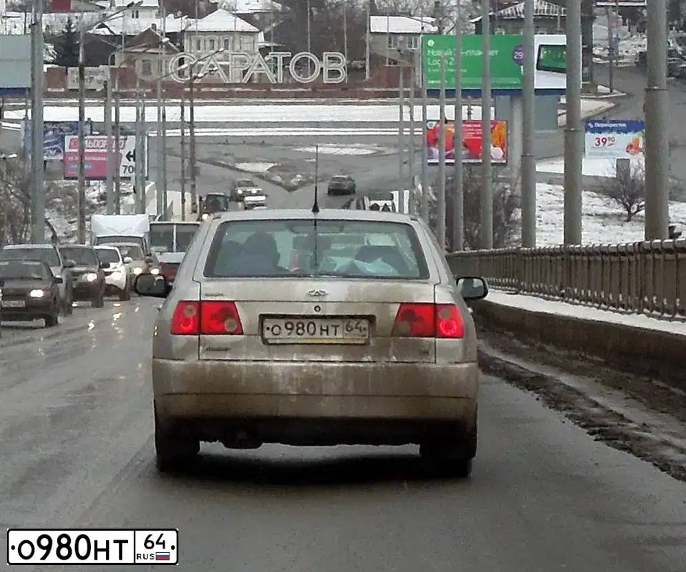 Фото автомобиля CHERY AMULET /FLAGCLOUD/, 2007 — госномер О980НТ64. Цвет: СЕРЫЙ