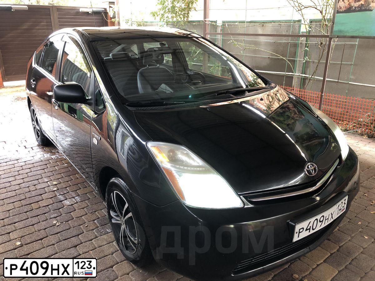 Фото автомобиля TOYOTA PRIUS, 2007 — госномер О707ОР761. Цвет: ЧЕРНЫЙ