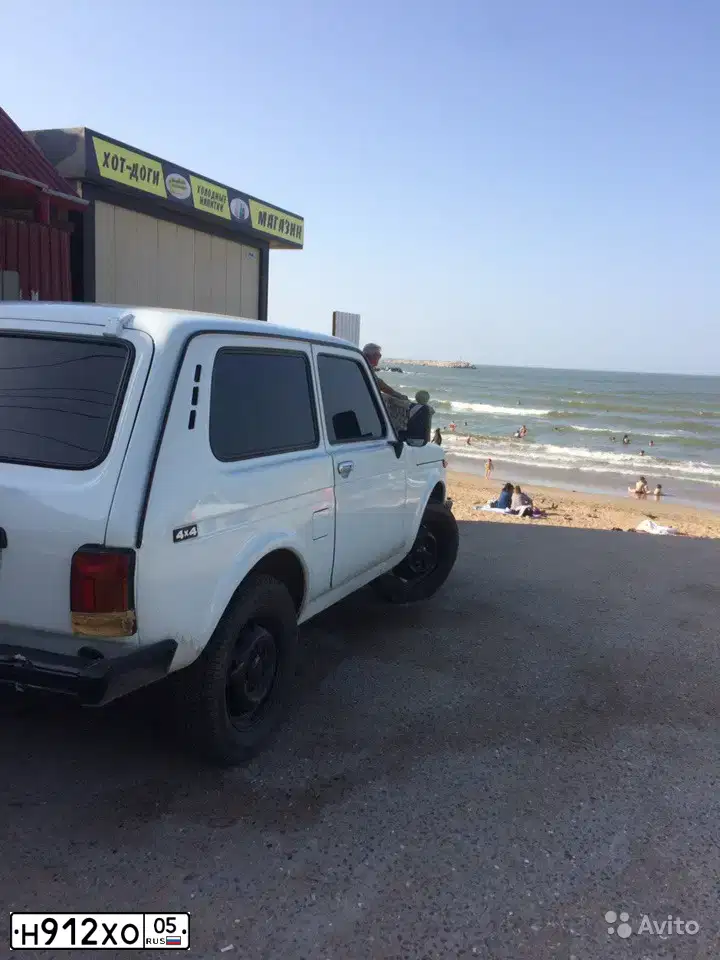 Фото автомобиля LADA 2121 NIVA, 2009 — госномер Е897КХ95. Цвет: ЯРКО-БЕЛЫЙ