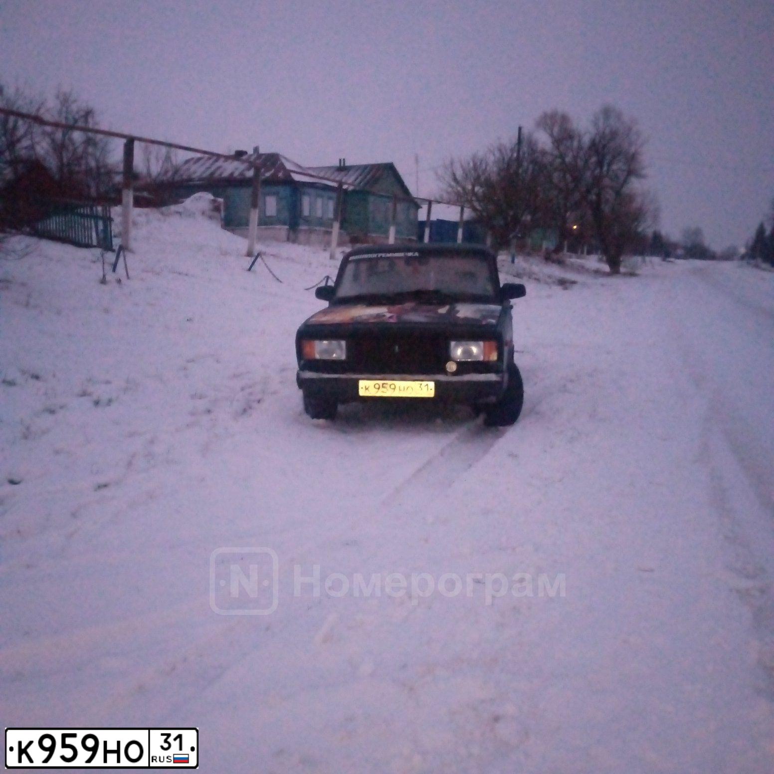 Фото автомобиля LADA 2107, 2007 — госномер К959НО31. Цвет: ТЕМНО-ЗЕЛЕНЫЙ