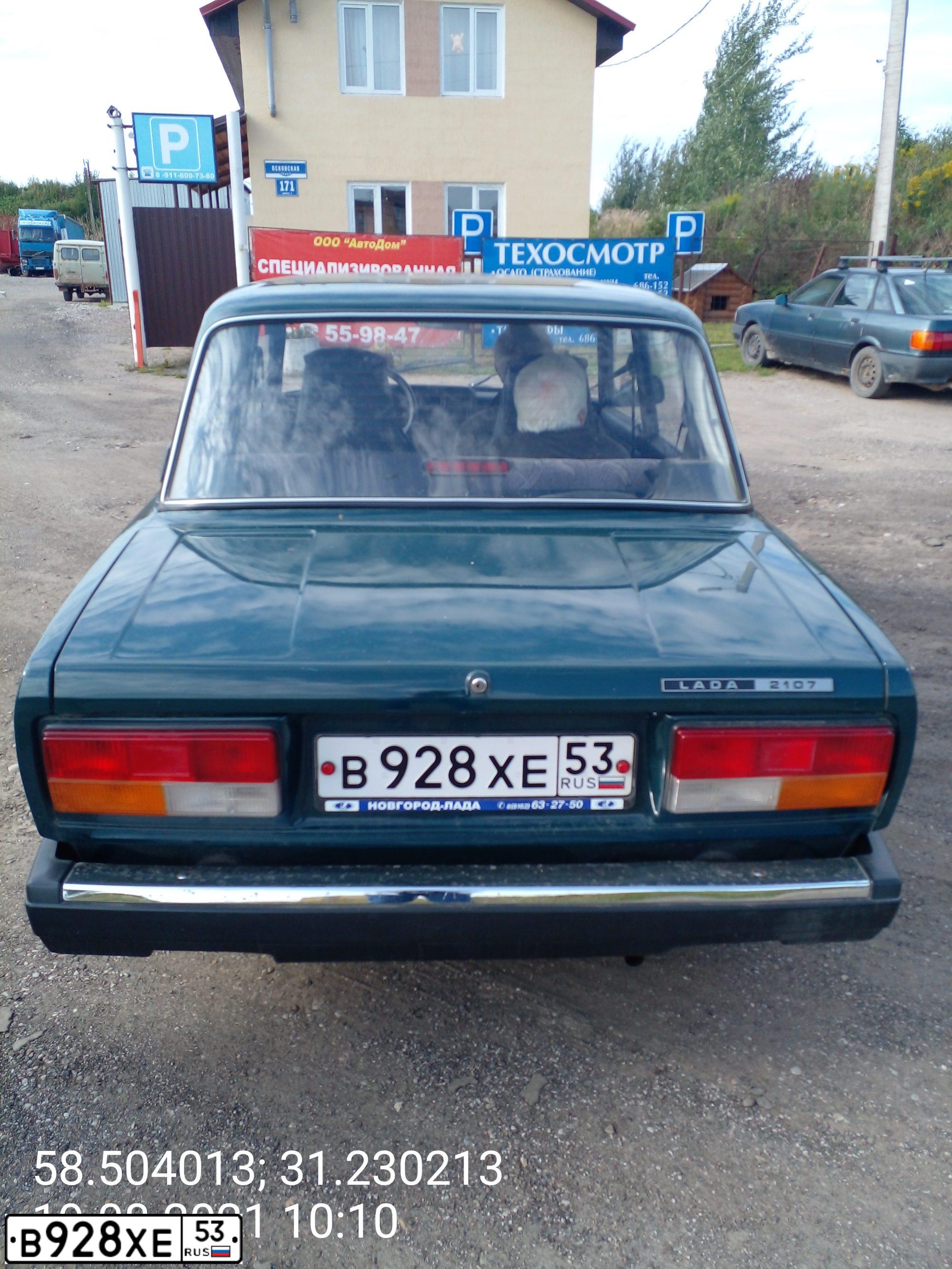 Фото автомобиля LADA 2107, 2009 — госномер В928ХЕ53. Цвет: ТЕМНО-ЗЕЛЕНЫЙ