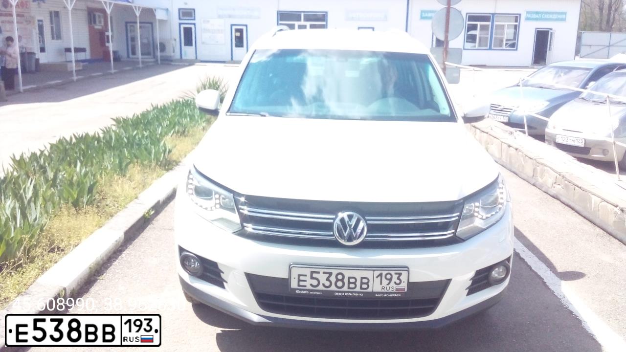 Фото автомобиля VOLKSWAGEN TIGUAN, 2016 — госномер Е538ВВ193. Цвет: Белый