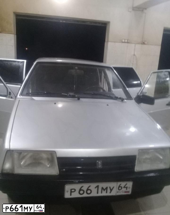 Фото автомобиля LADA 2109 SAMARA, 2002 — госномер Н039КС64. Цвет: СВЕТЛО СЕРЫЙ