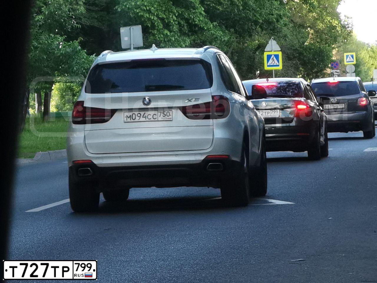 Фото автомобиля BMW SERIE 7, 2008 — госномер Т070АА26. Цвет: Темно-синий
