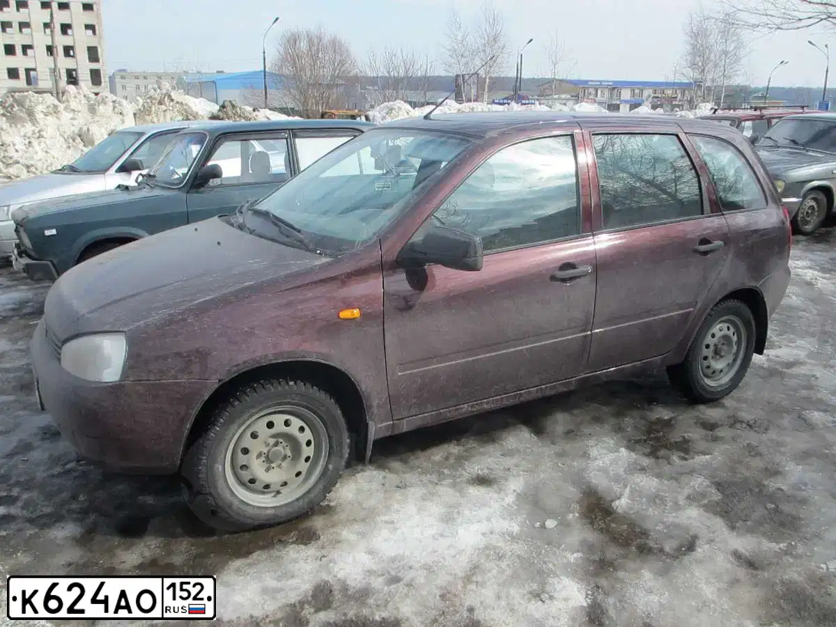 Фото автомобиля FORD FOCUS, 2012 — госномер К624АО152. Цвет: Белый