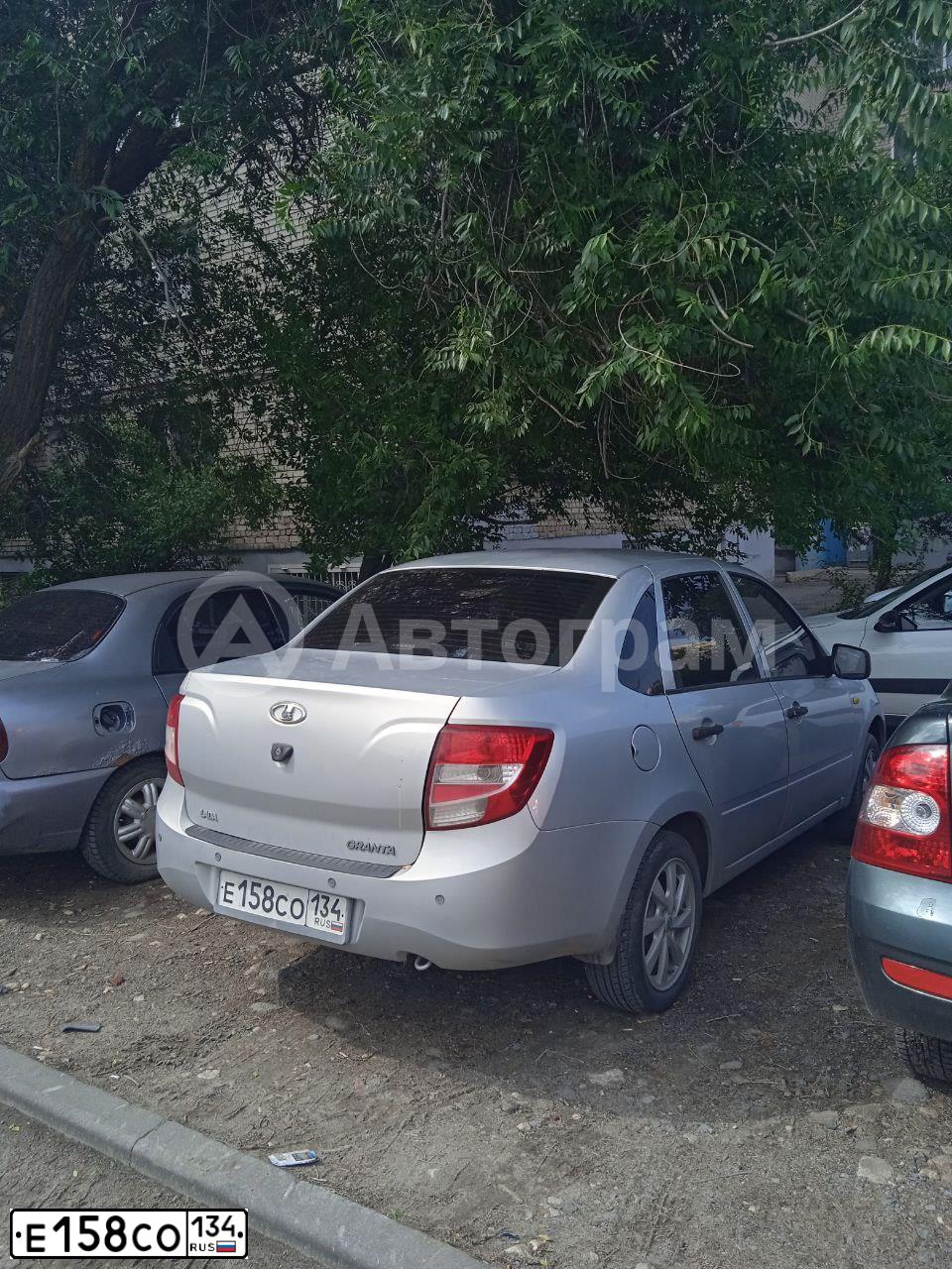 Фото автомобиля LADA 2190 GRANTA, 2014 — госномер Е158СО134. Цвет: СЕРЕБРИСТЫЙ
