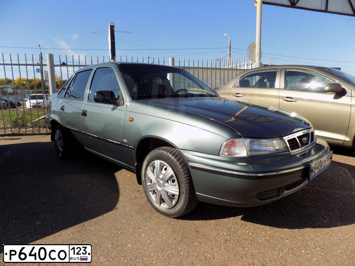 Фото автомобиля DAEWOO NEXIA, 2008 — госномер Е014АН750. Цвет: ЖЁЛТЫЙ