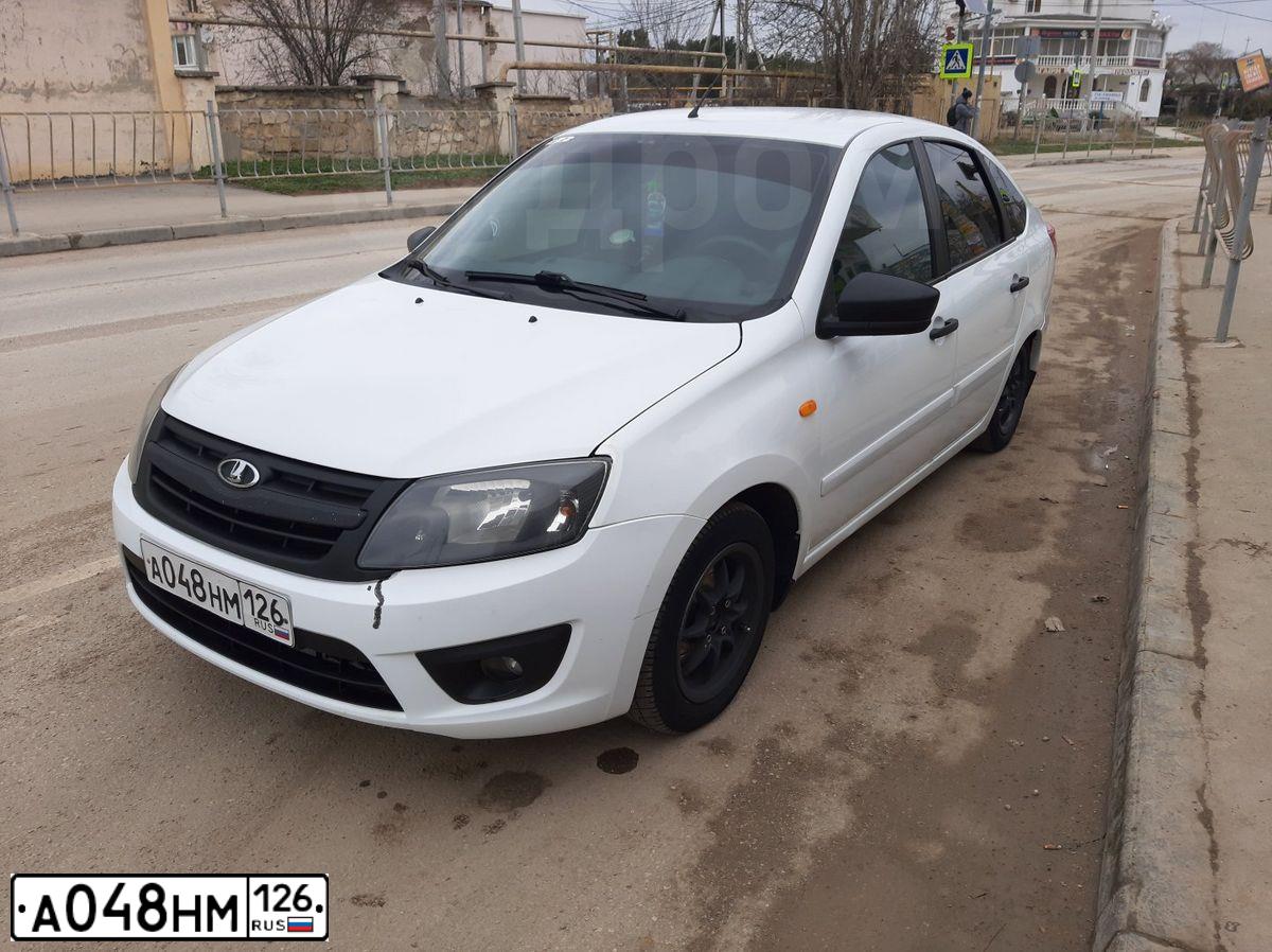 Фото автомобиля LADA GRANTA, 2014 — госномер М432МР82. Цвет: Белый