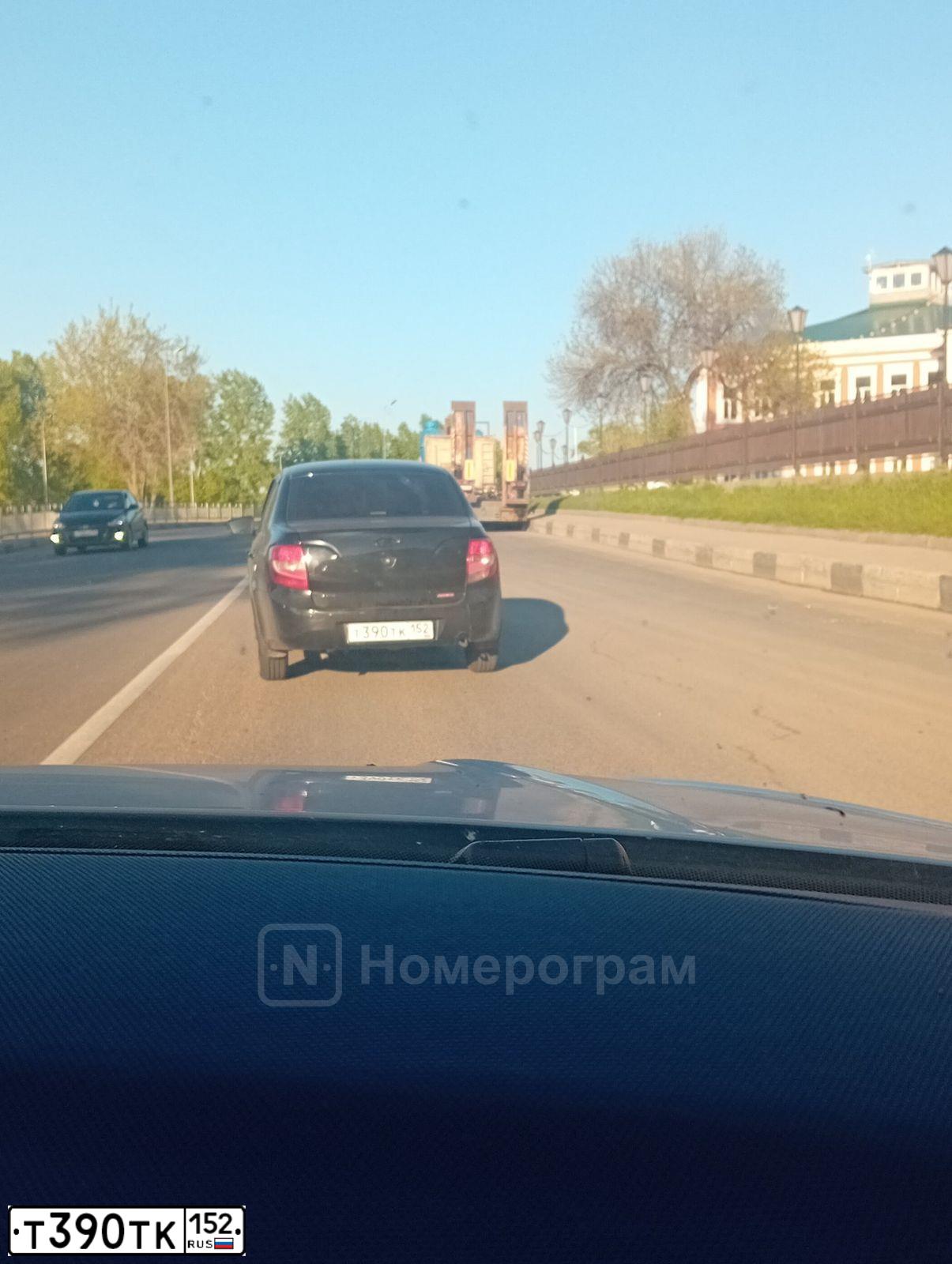 Фото автомобиля LADA 2190 GRANTA, 2013 — госномер Т390ТК152. Цвет: ЧЕРНЫЙ