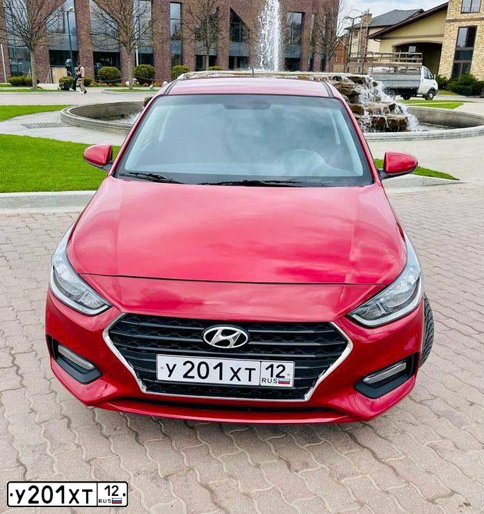 Фото автомобиля HYUNDAI SOLARIS, 2017 — госномер Х707ВР12. Цвет: Красный