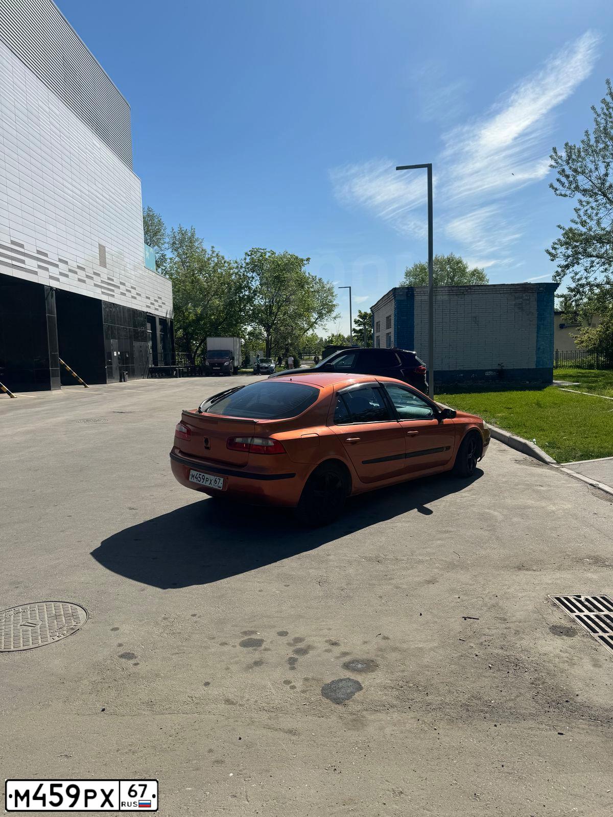 Фото автомобиля RENAULT LAGUNA, 2004 — госномер М459РХ67. Цвет: Оранжевый