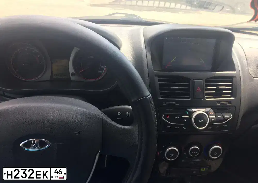 Фото автомобиля LADA 2192 KALINA, 2013 — госномер Н232ЕК46. Цвет: СЕРО-СИНИЙ