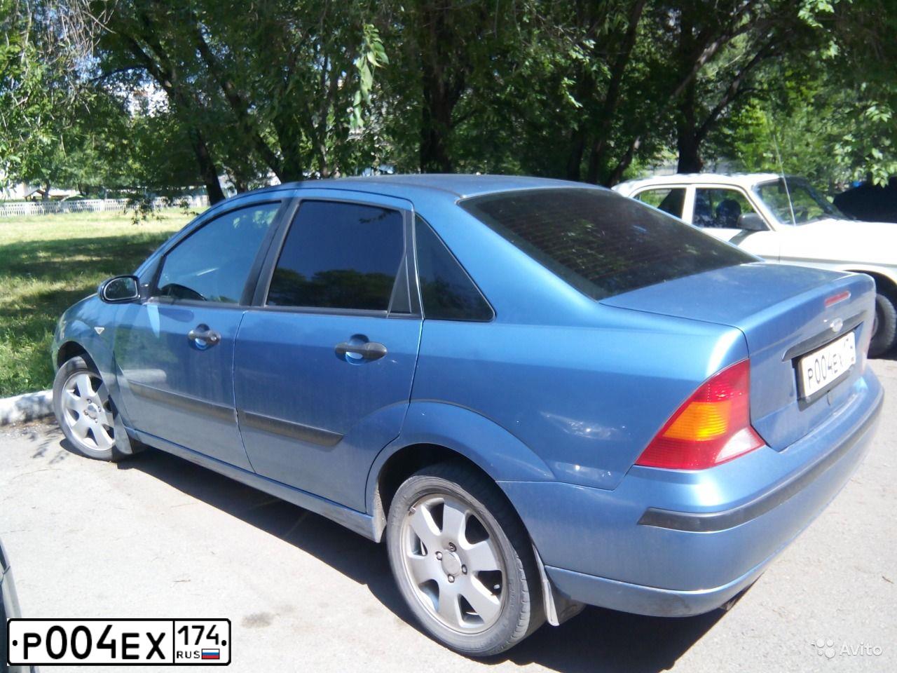 Фото автомобиля FORD FOCUS, 2003 — госномер Р004ЕХ174. Цвет: СВЕТЛО-ГОЛУБОЙ