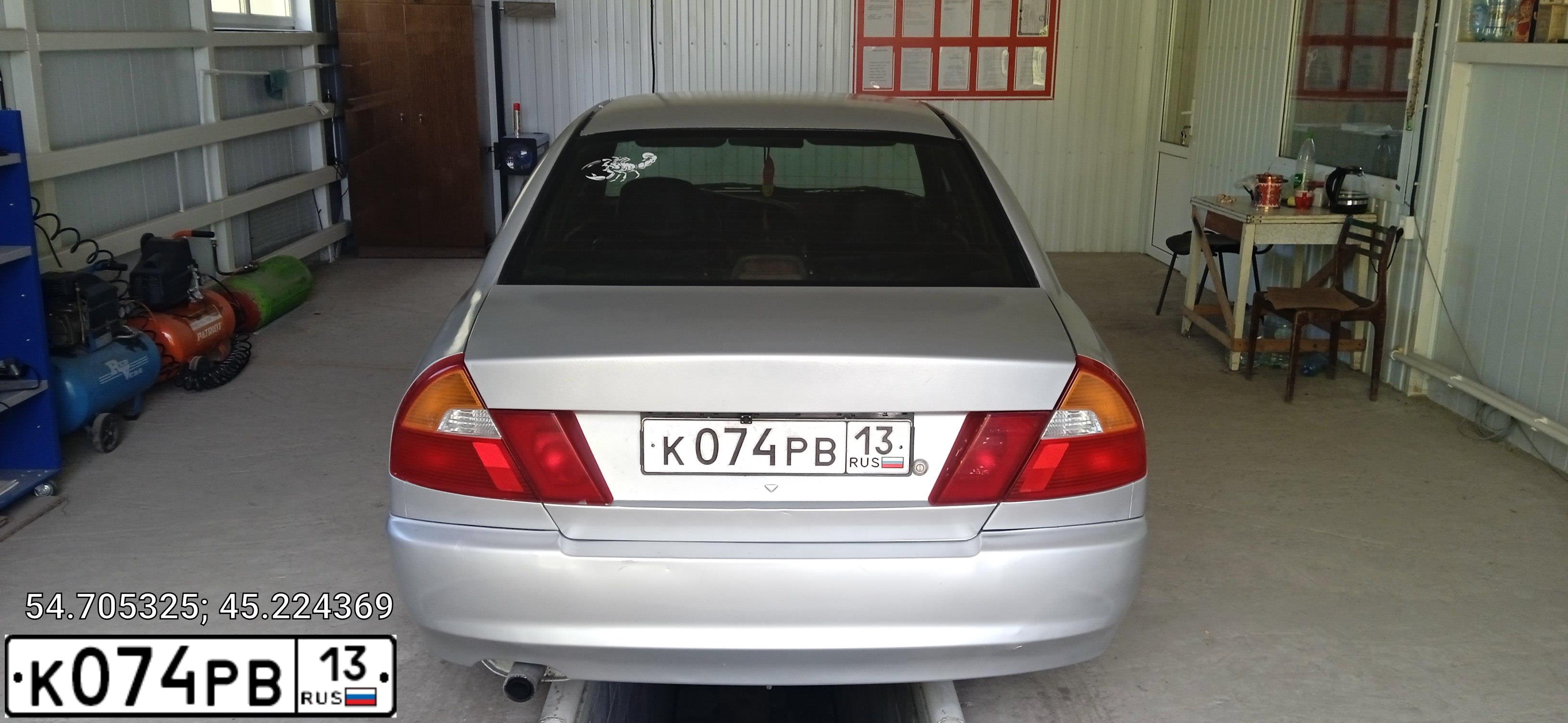 Фото автомобиля MITSUBISHI LANCER, 2000 — госномер К074РВ13. Цвет: СЕРЕБРИСТЫЙ