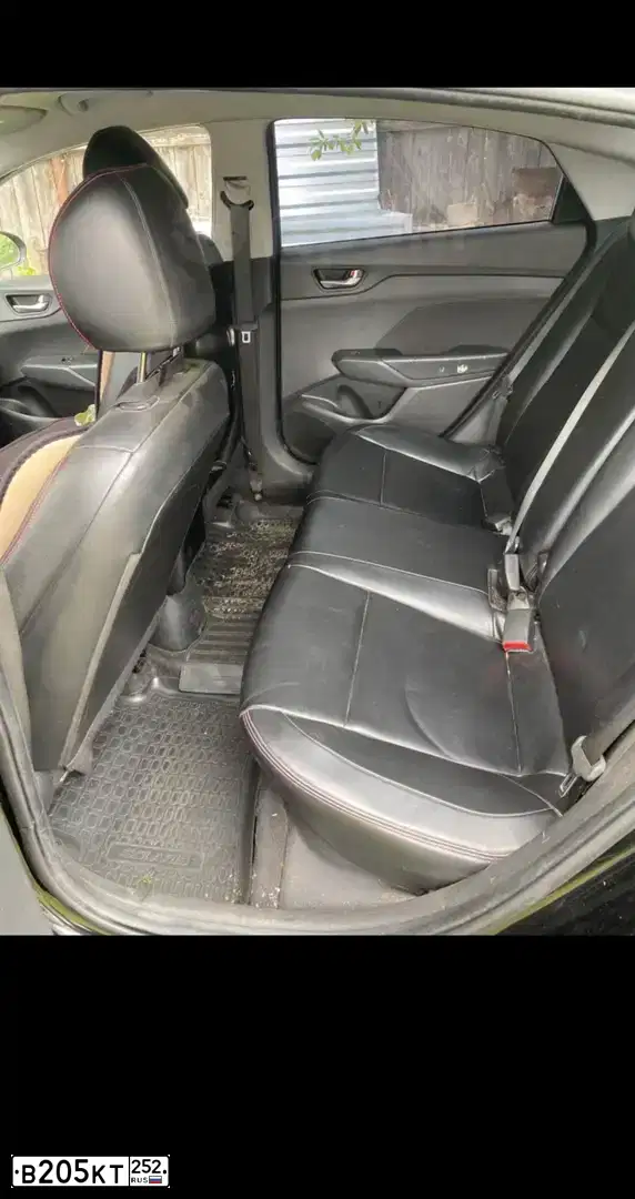Фото автомобиля HYUNDAI SOLARIS, 2018 — госномер В205КТ252. Цвет: ЧЕРНЫЙ