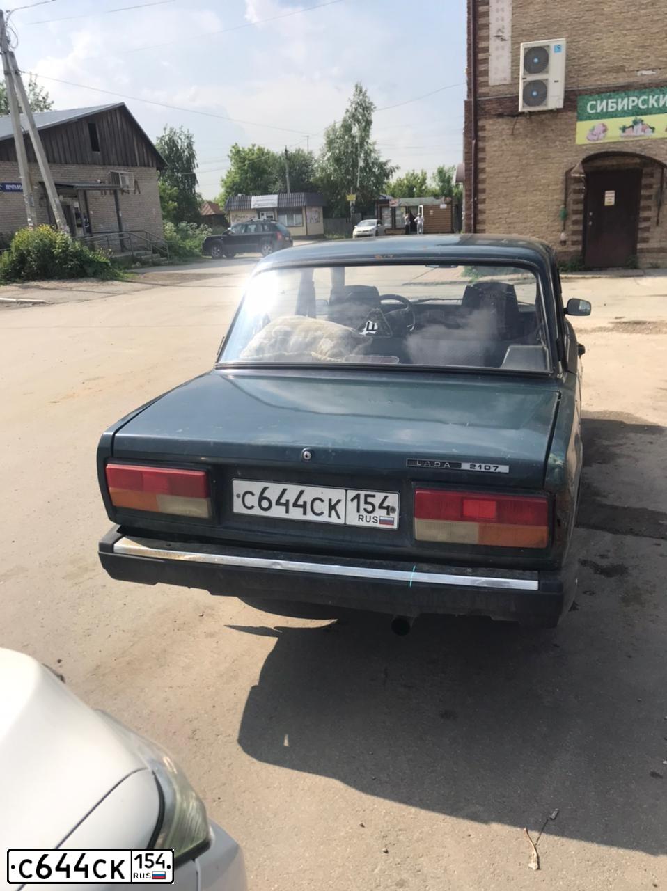 Фото автомобиля LADA 2107, 2007 — госномер С664СК154. Цвет: ЗЕЛЕНЫЙ-ТЕМНО ЗЕЛЕН