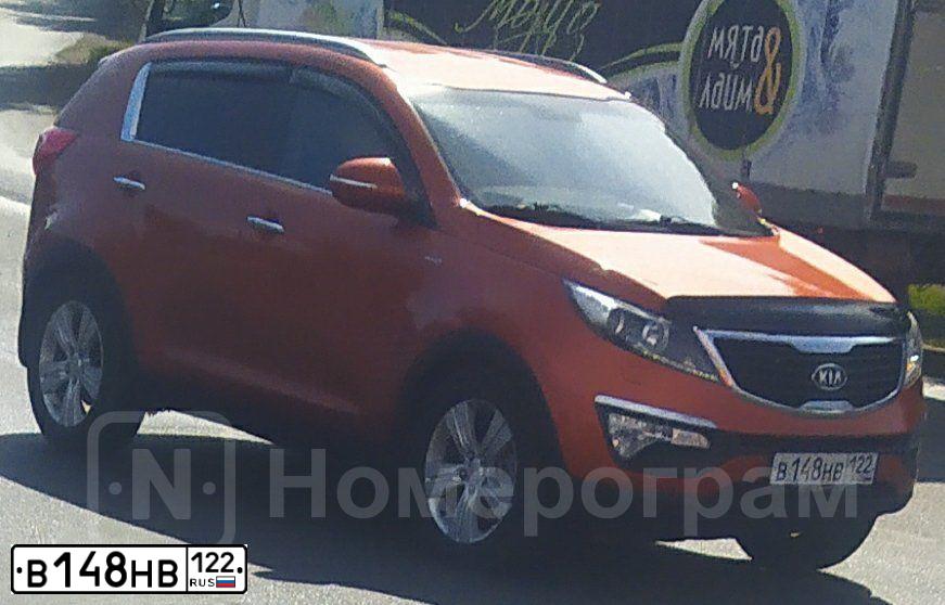 Фото автомобиля KIA SPORTAGE, 2011 — госномер А390ХО154. Цвет: Оранжевый