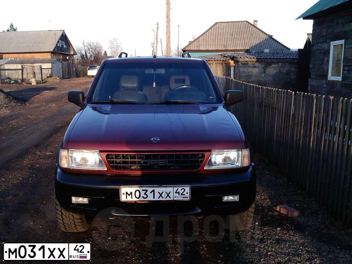 Фото автомобиля OPEL FRONTERA, 1996 — госномер В136УО122. Цвет: Красный