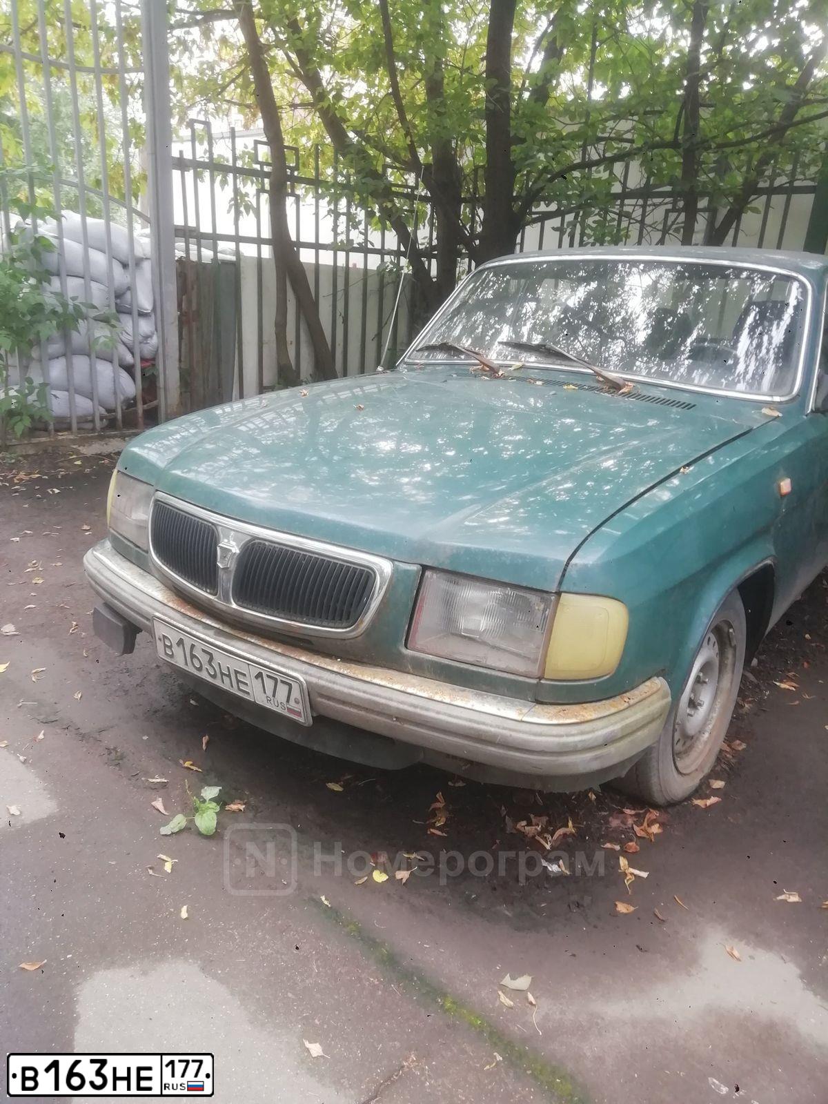 Фото автомобиля GAZ 3110 WOLGA, 1999 — госномер В163НЕ177. Цвет: ТЕМНО-ЗЕЛЕНЫЙ