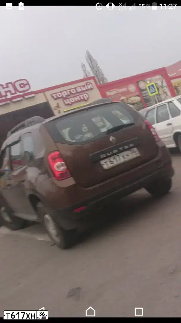Фото автомобиля RENAULT DUSTER, 2013 — госномер Т617ХН36. Цвет: Коричневый