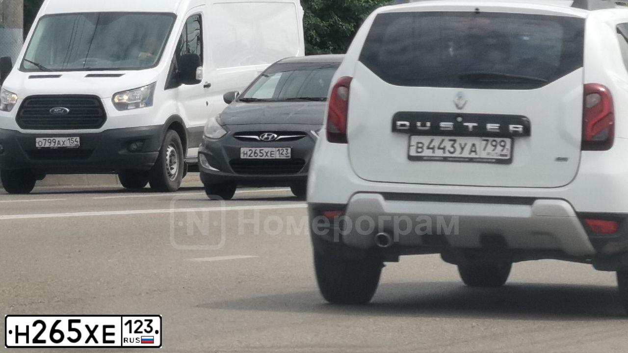 Фото автомобиля HYUNDAI SOLARIS, 2011 — госномер Н265ХЕ123. Цвет: Черно Серый