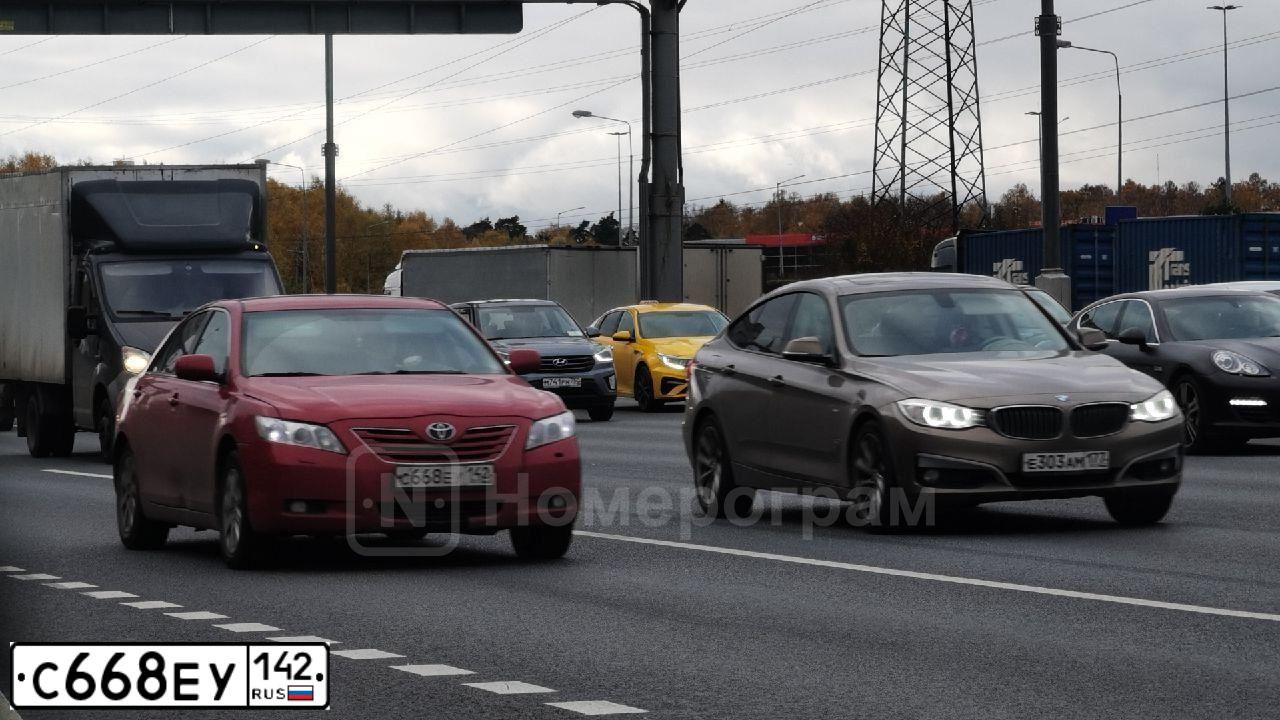 Фото автомобиля TOYOTA CAMRY, 2007 — госномер С668ЕУ142. Цвет: КРАСНЫЙ