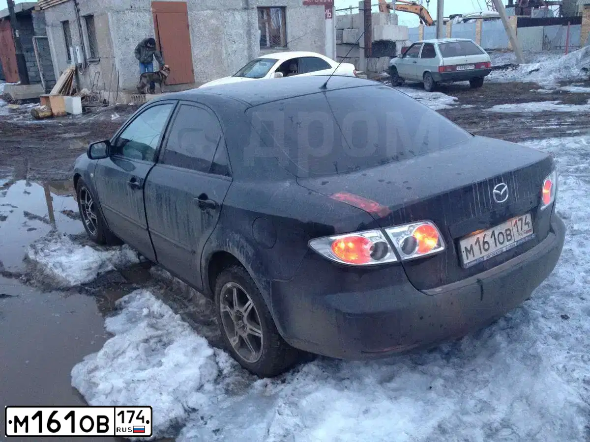 Фото автомобиля MAZDA 6, 2002 — госномер Т512УТ174. Цвет: ЧЕРНЫЙ
