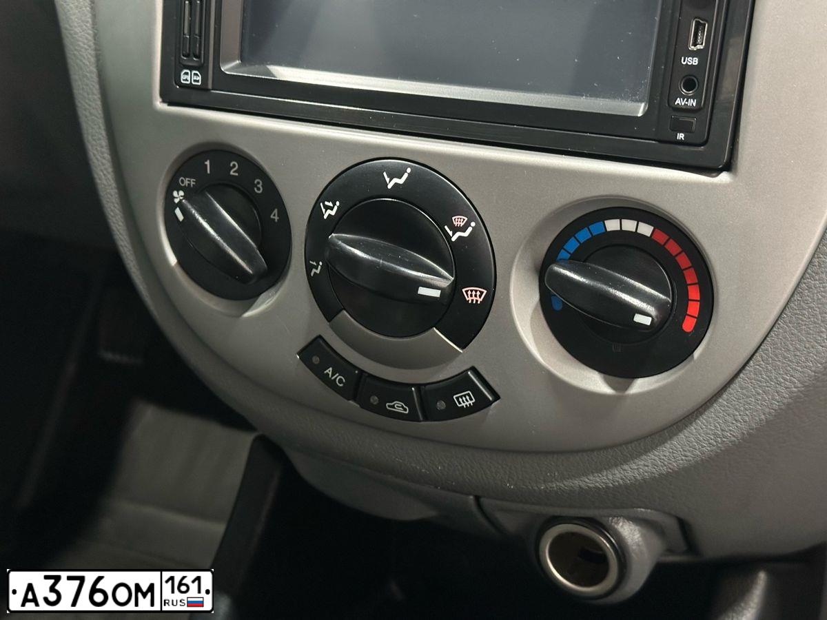 Фото автомобиля CHEVROLET T LACETTI, 2012 — госномер Т852ОХ761. Цвет: КРАСНЫЙ
