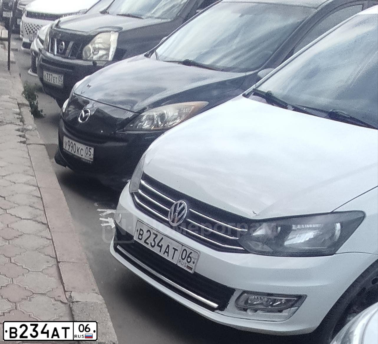 Фото автомобиля VOLKSWAGEN POLO, 2017 — госномер В234АТ06. Цвет: Белый