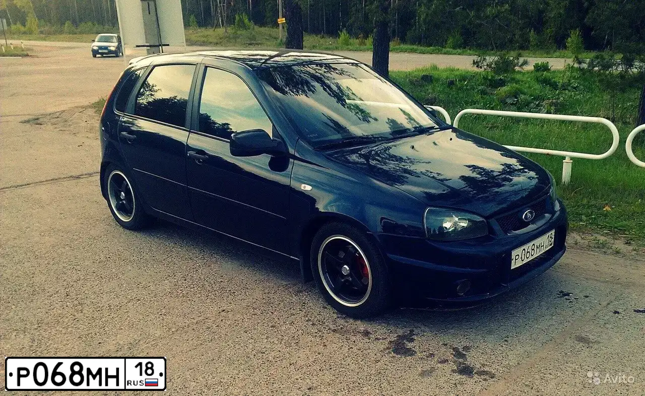 Фото автомобиля LADA KALINA, 2008 — госномер Н291МА702. Цвет: ТЕМНЫЙ СИНЕ-ФИОЛЕТОВЫЙ