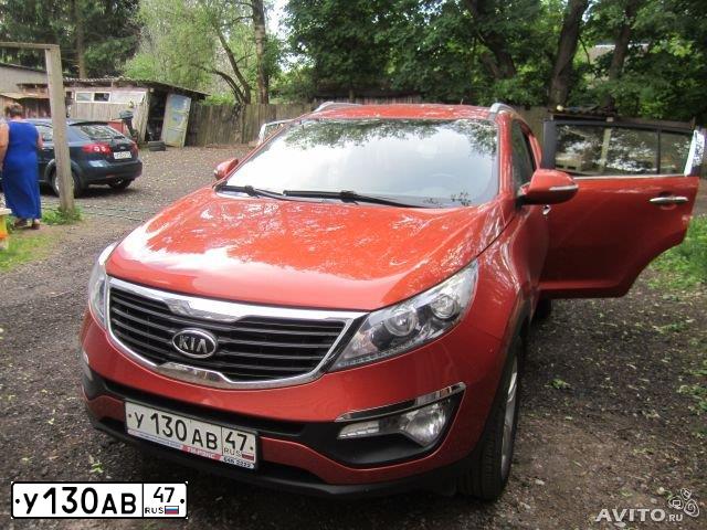Фото автомобиля KIA SPORTAGE, 2011 — госномер Е226ТК53. Цвет: Оранжевый