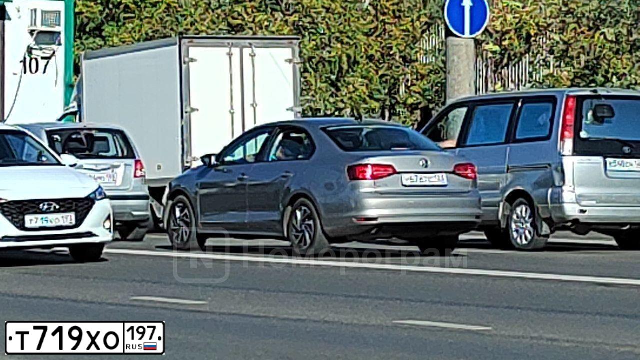 Фото автомобиля KIA SPORTAGE, 2006 — госномер М310УО177. Цвет: СЕРЕБРИСТЫЙ