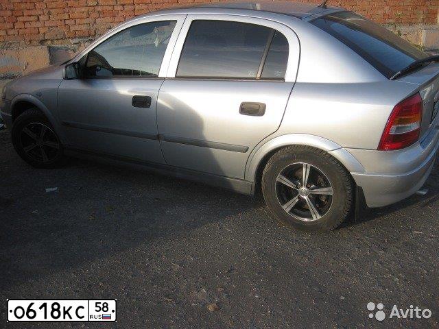 Фото автомобиля OPEL ASTRA, 2001 — госномер Х014НЕ37. Цвет: СЕРЕБРИСТЫЙ