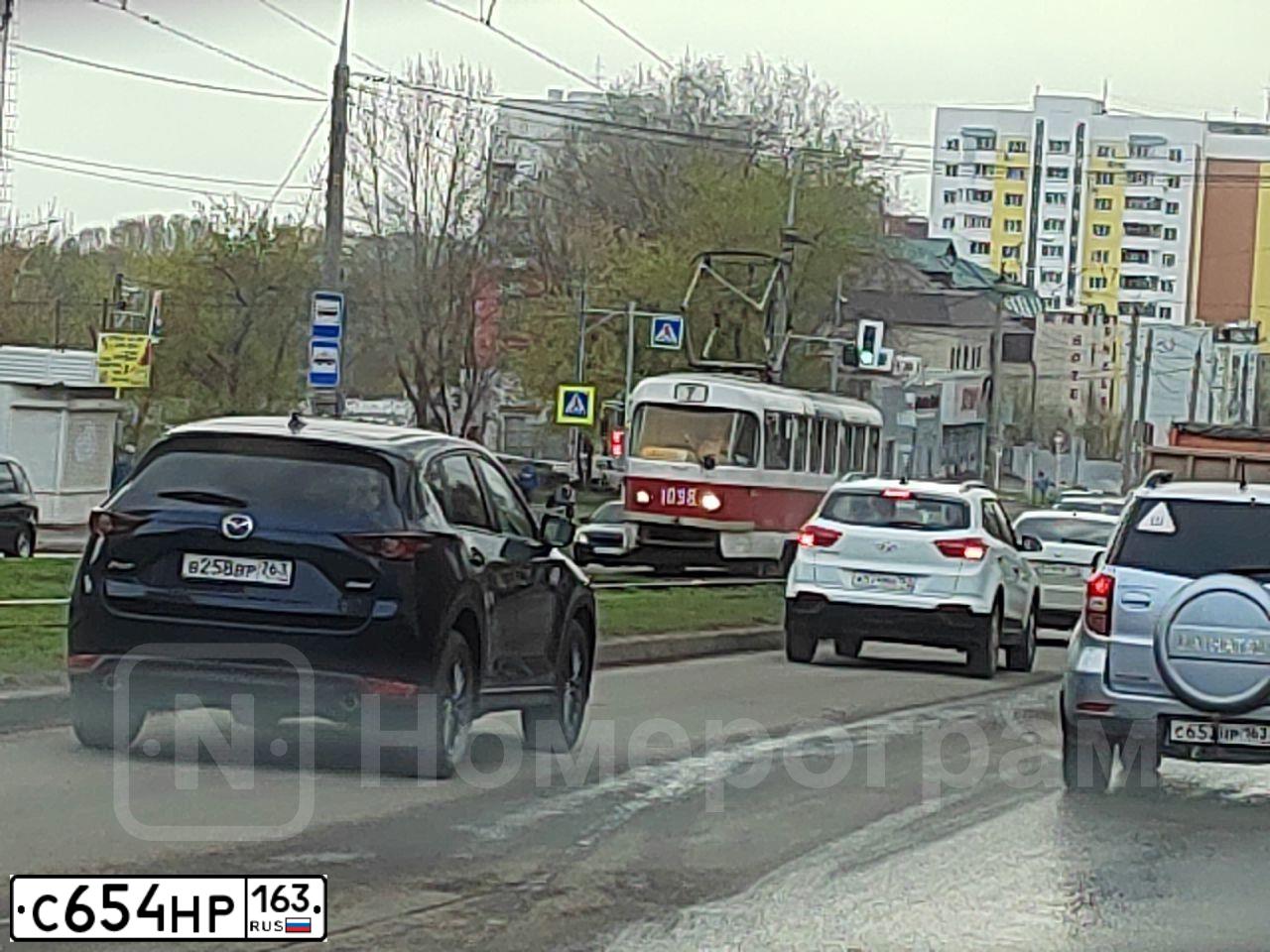 Фото автомобиля LADA 2107, 1997 — госномер С654НР163. Цвет: ВИШНЕВЫЙ