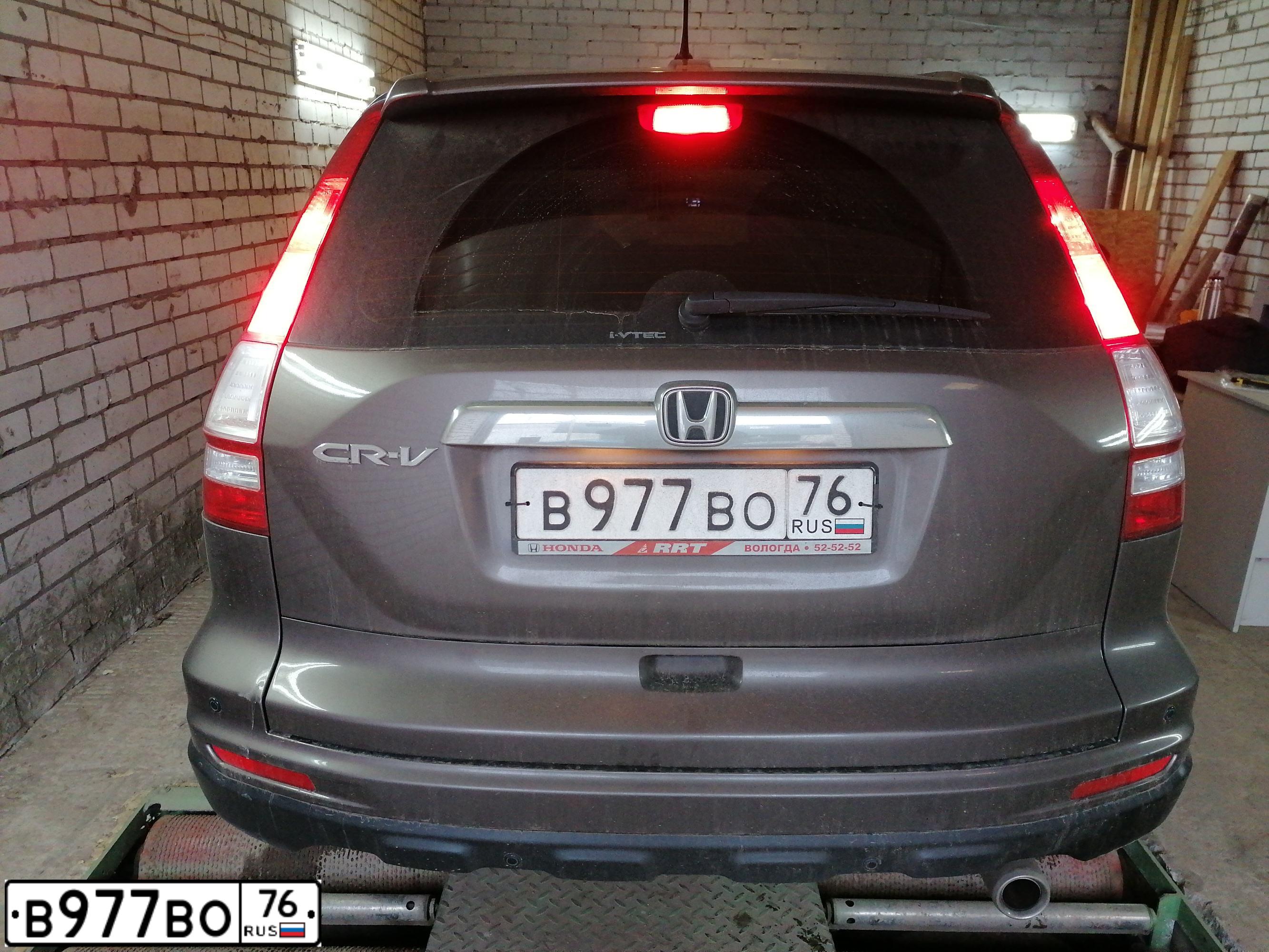 Фото автомобиля HONDA CR-V, 2010 — госномер В977ВО76. Цвет: СЕРО-КОРИЧНЕВЫЙ