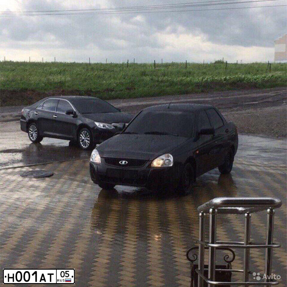Фото автомобиля TOYOTA COROLLA, 2008 — госномер Н001АТ05. Цвет: ЧЕРНЫЙ