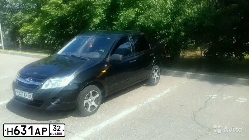Фото автомобиля LADA 2190 GRANTA, 2012 — госномер М084РК73. Цвет: ЧЕРНЫЙ