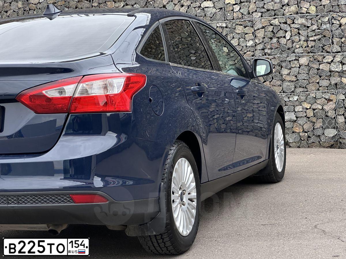 Фото автомобиля FORD FOCUS, 2013 — госномер Р331ТС124