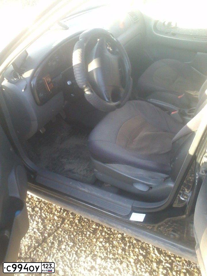 Фото автомобиля KIA SPECTRA, 2008 — госномер А895ТР01. Цвет: ЧЕРНЫЙ