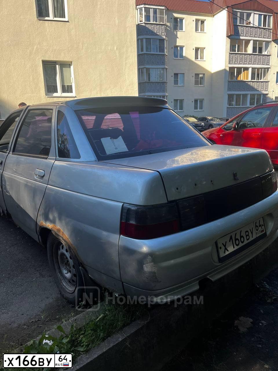 Фото автомобиля OPEL VECTRA, 1999 — госномер Х166ВУ64. Цвет: синий