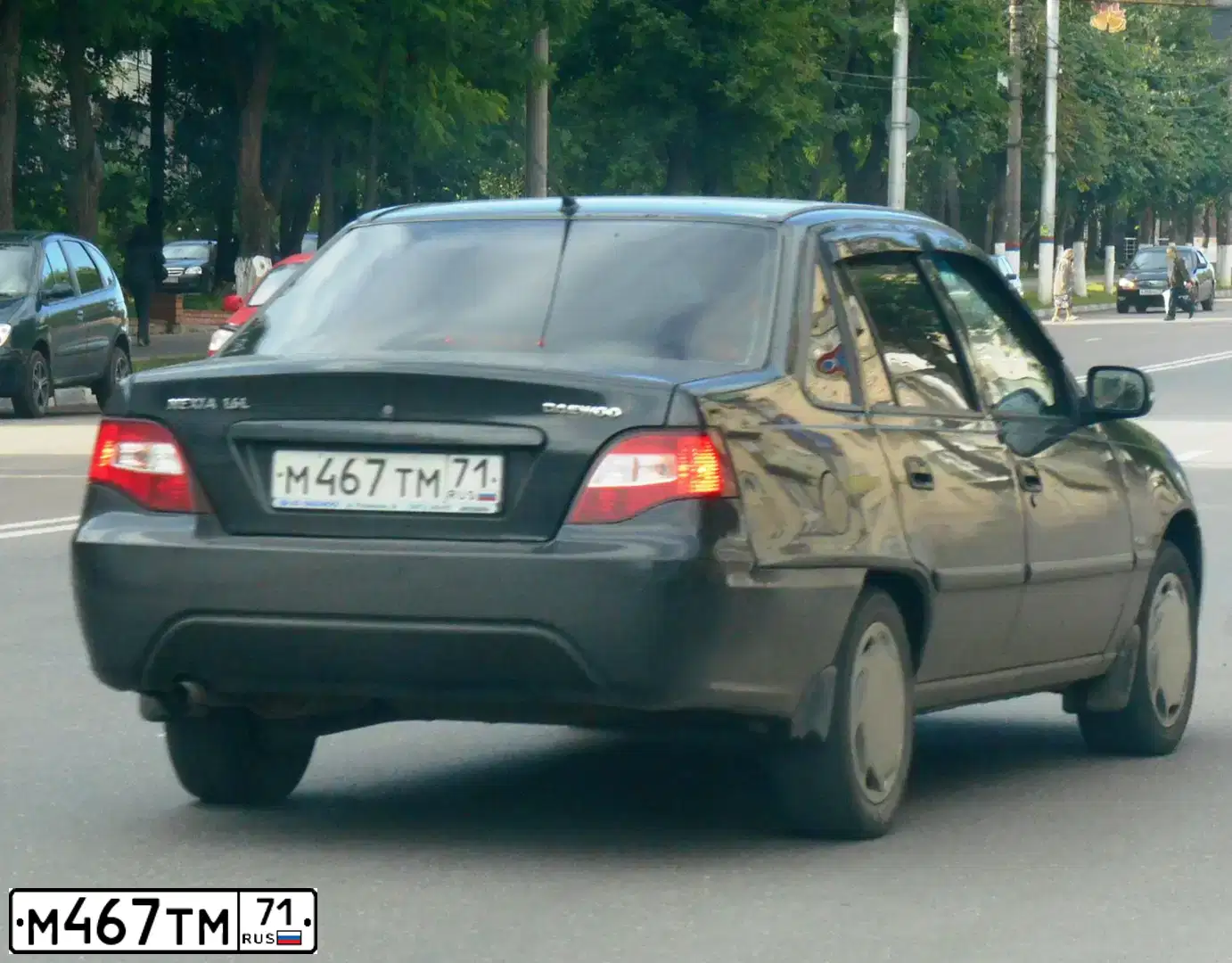 Фото автомобиля DAEWOO O NEXIA, 2012 — госномер Т114ЕХ71. Цвет: Бледно-Черный