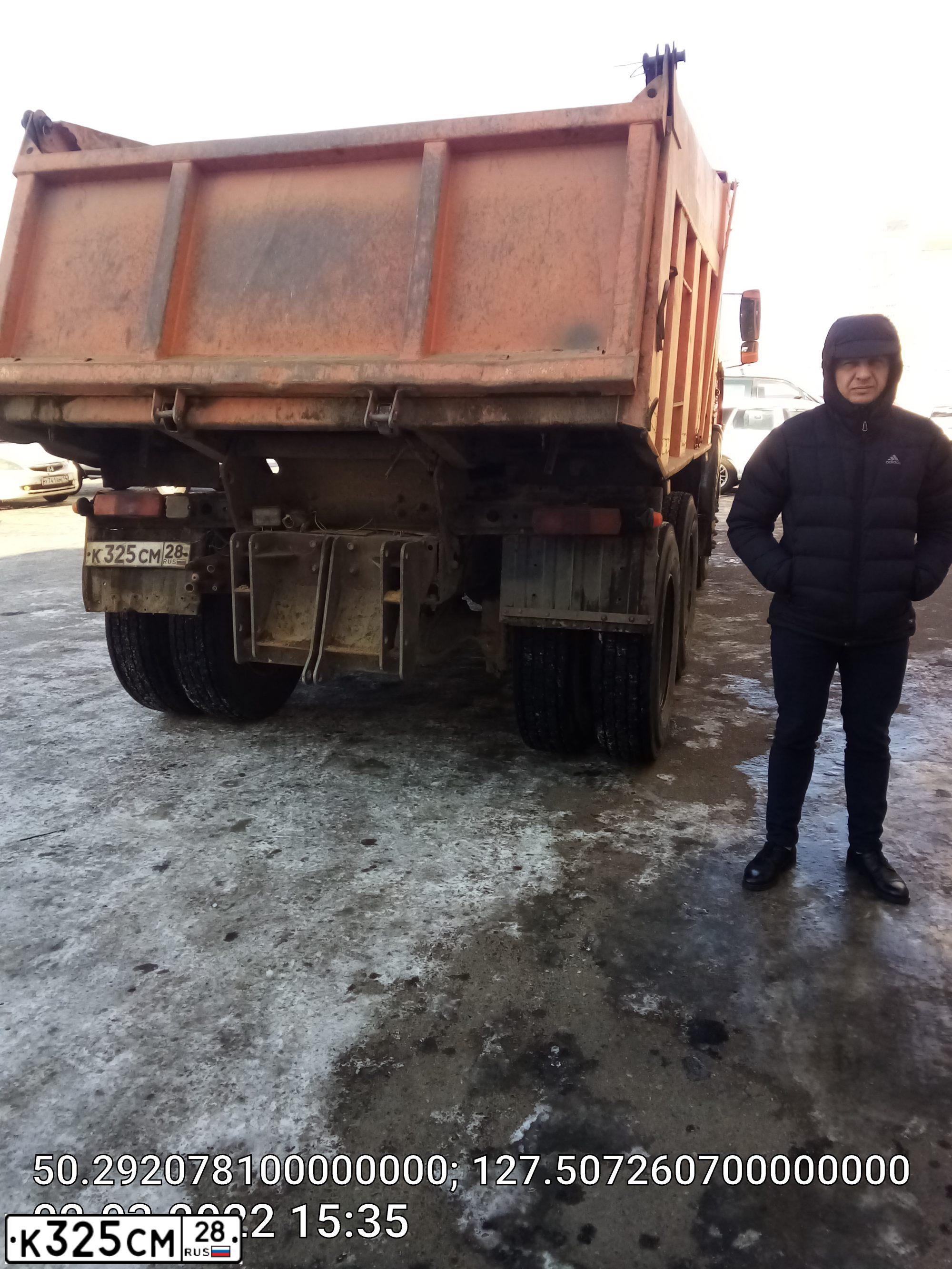 Фото автомобиля KAMAZ 65111 /6X6/, 2013 — госномер К325СМ28. Цвет: Оранжевый