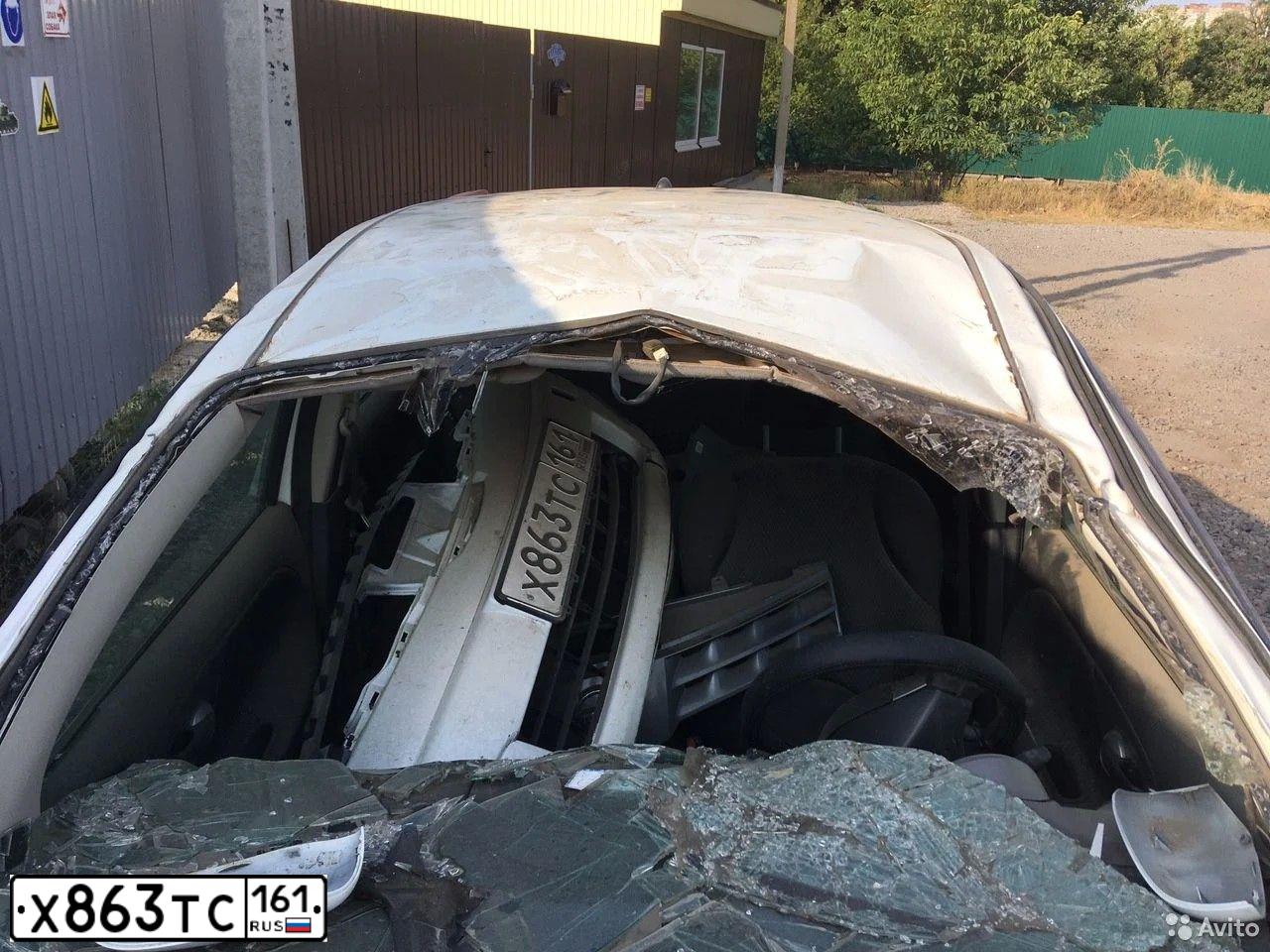 Фото автомобиля NISSAN NOTE, 2007 — госномер Е150ЕВ761. Цвет: Белый