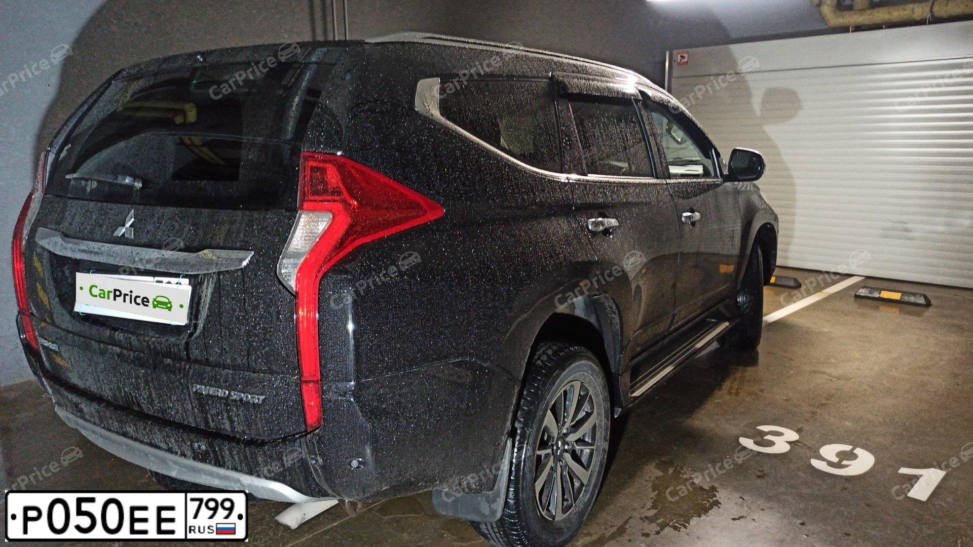 Фото автомобиля MITSUBISHI PAJERO SPORT, 2019 — госномер Р050ЕЕ799. Цвет: ЧЕРНЫЙ