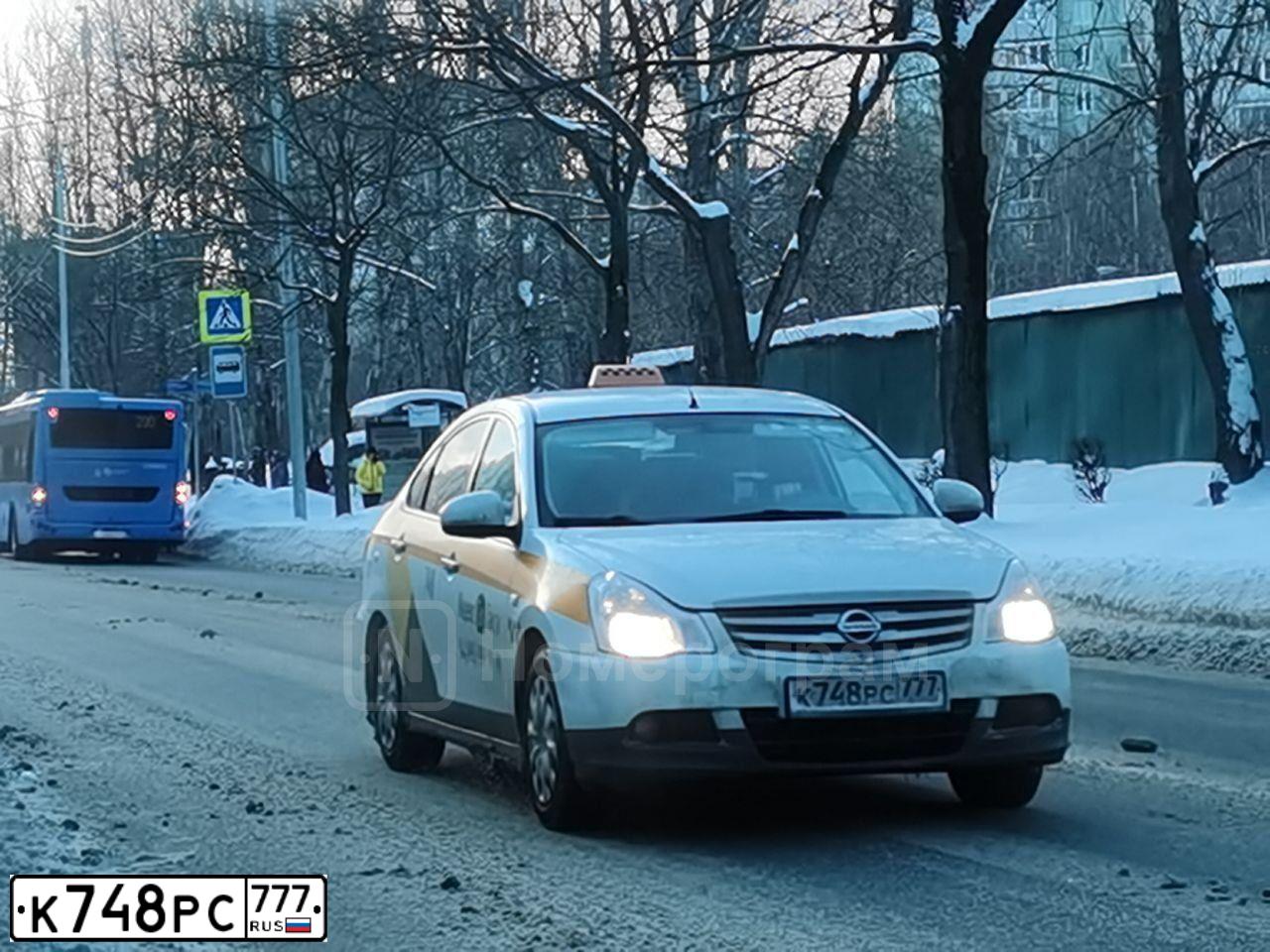 Фото автомобиля NISSAN ALMERA /AVTOVAZ/, 2015 — госномер К748РС777. Цвет: Белый