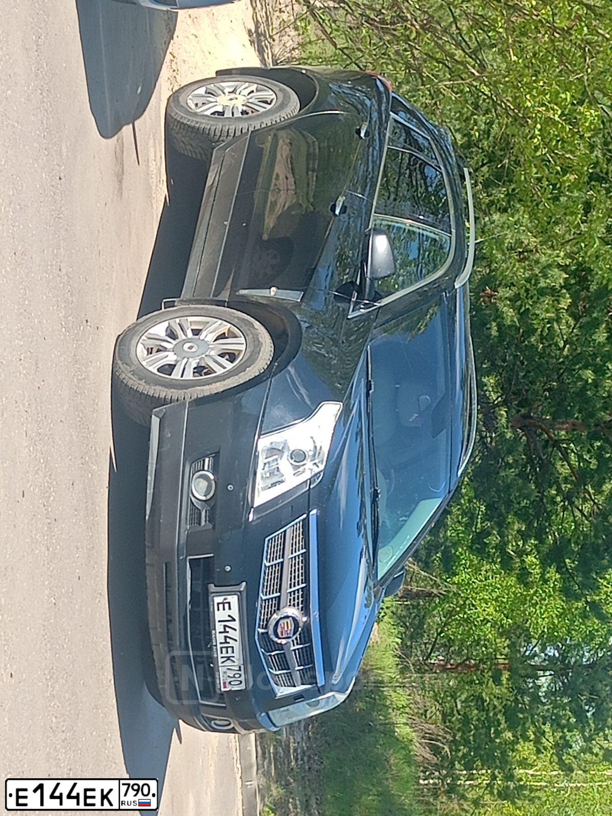 Фото автомобиля CADILLAC SRX, 2010 — госномер Е144ЕК790. Цвет: ЧЕРНЫЙ
