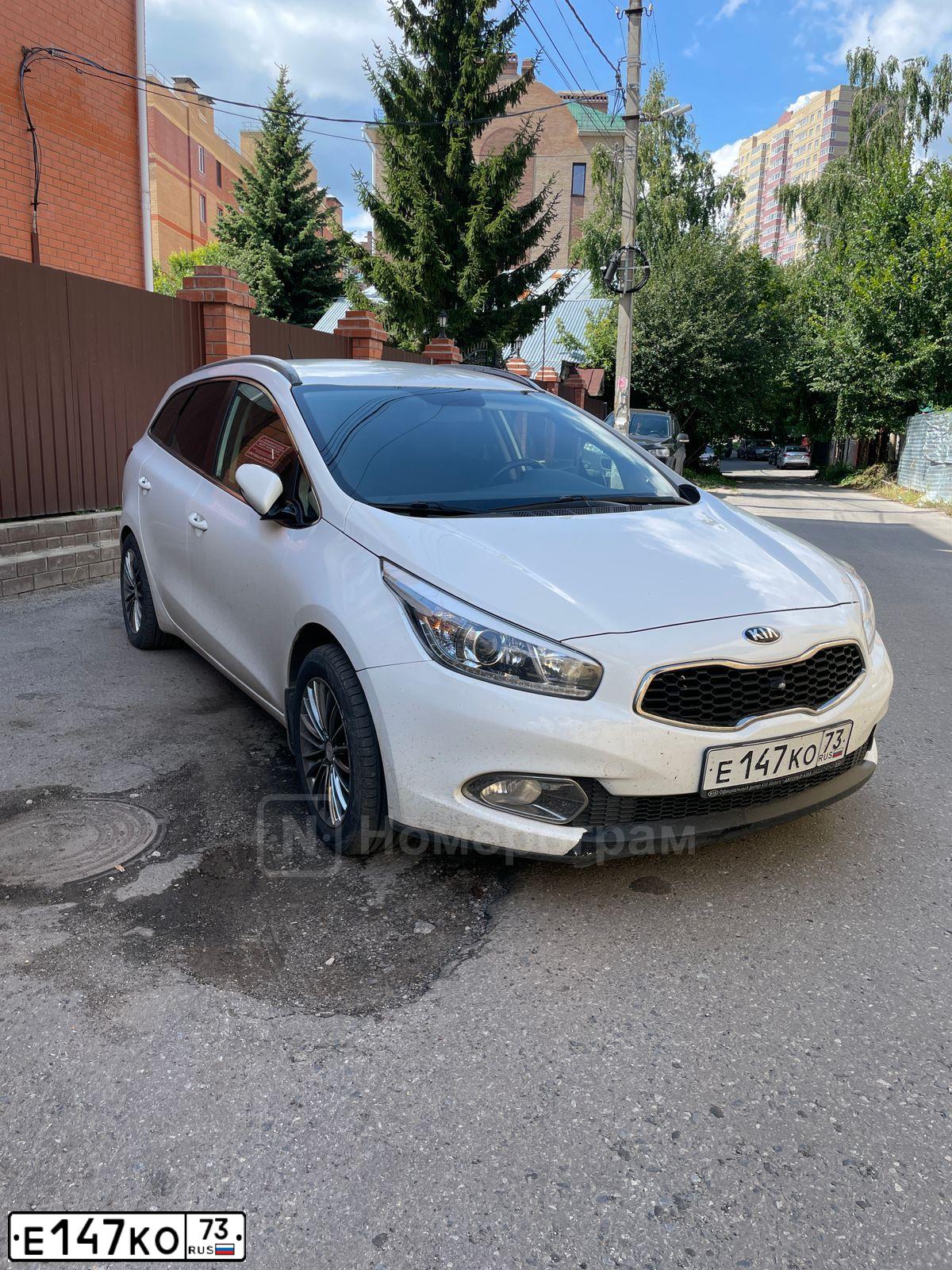 Фото автомобиля KIA CEE'D, 2014 — госномер Е147КО73. Цвет: Белый