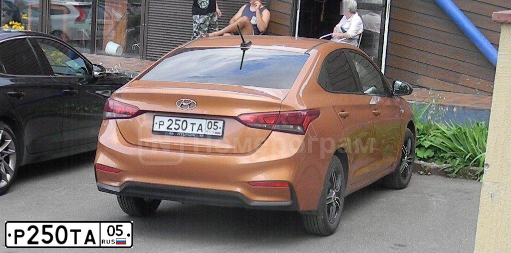 Фото автомобиля HYUNDAI SOLARIS, 2017 — госномер Р250ТА05. Цвет: Оранжевый